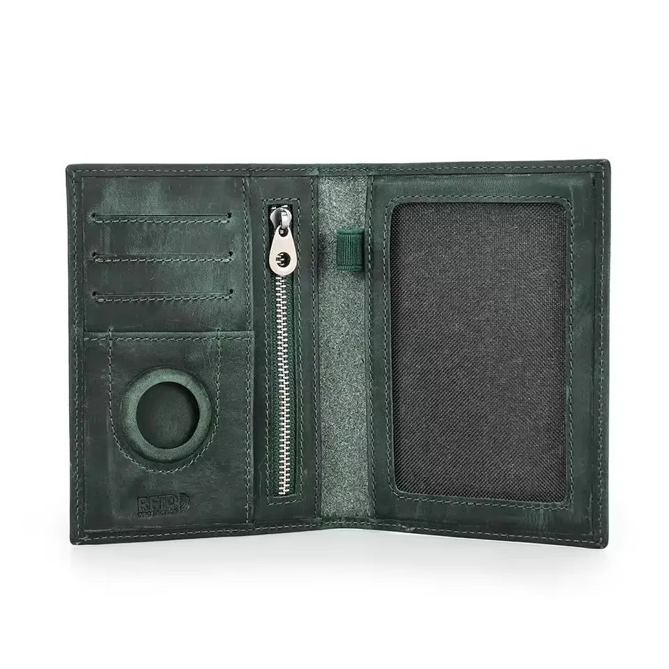 Forest green leather passport wallet interior with card slots, zipper, and round AirTag holder