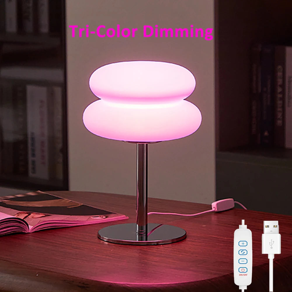 Pink glowing mushroom USB table lamp on desk with USB cable and controller