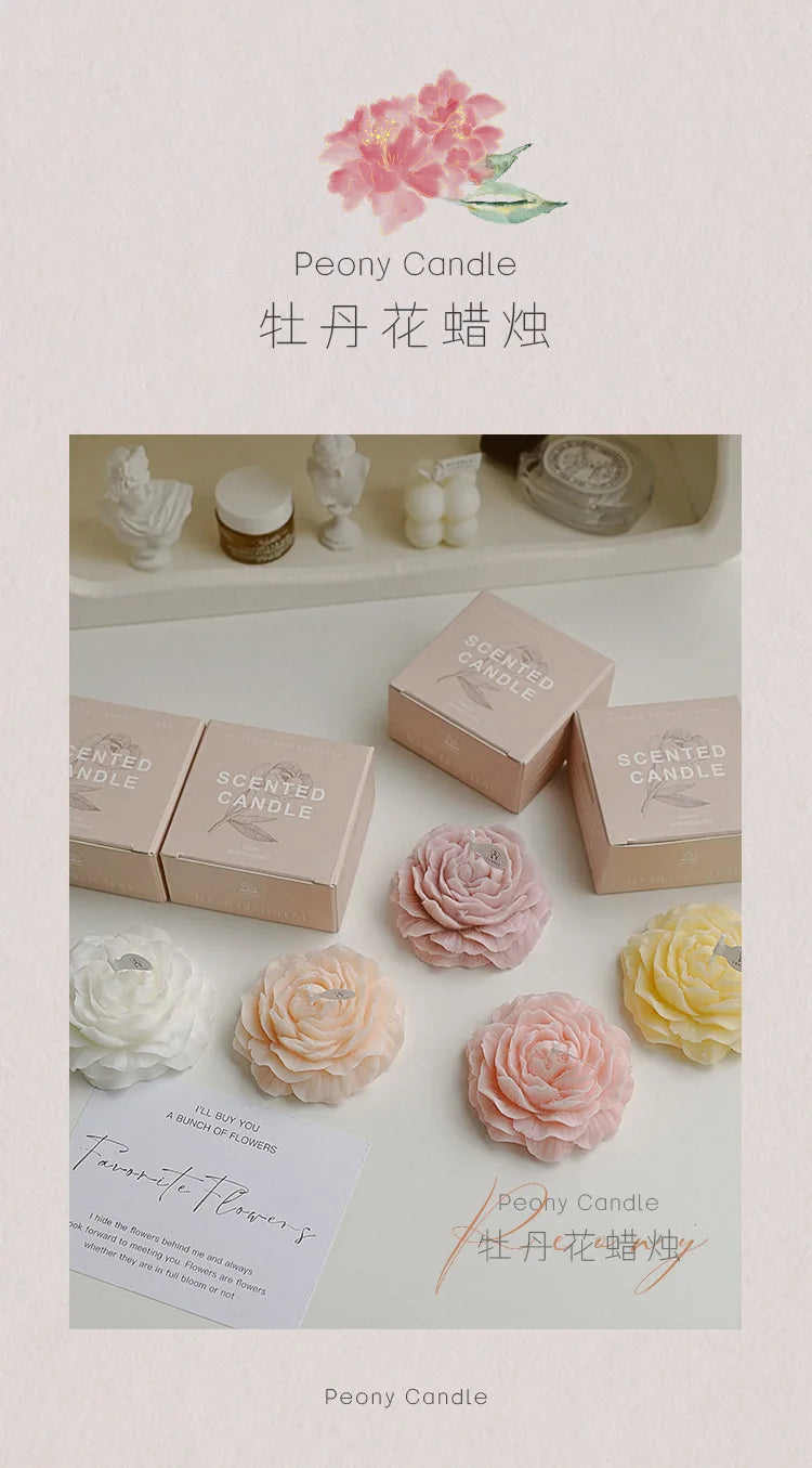 Peony sculptural candle gift set with pink flower candle, multiple boxed candles on a tray