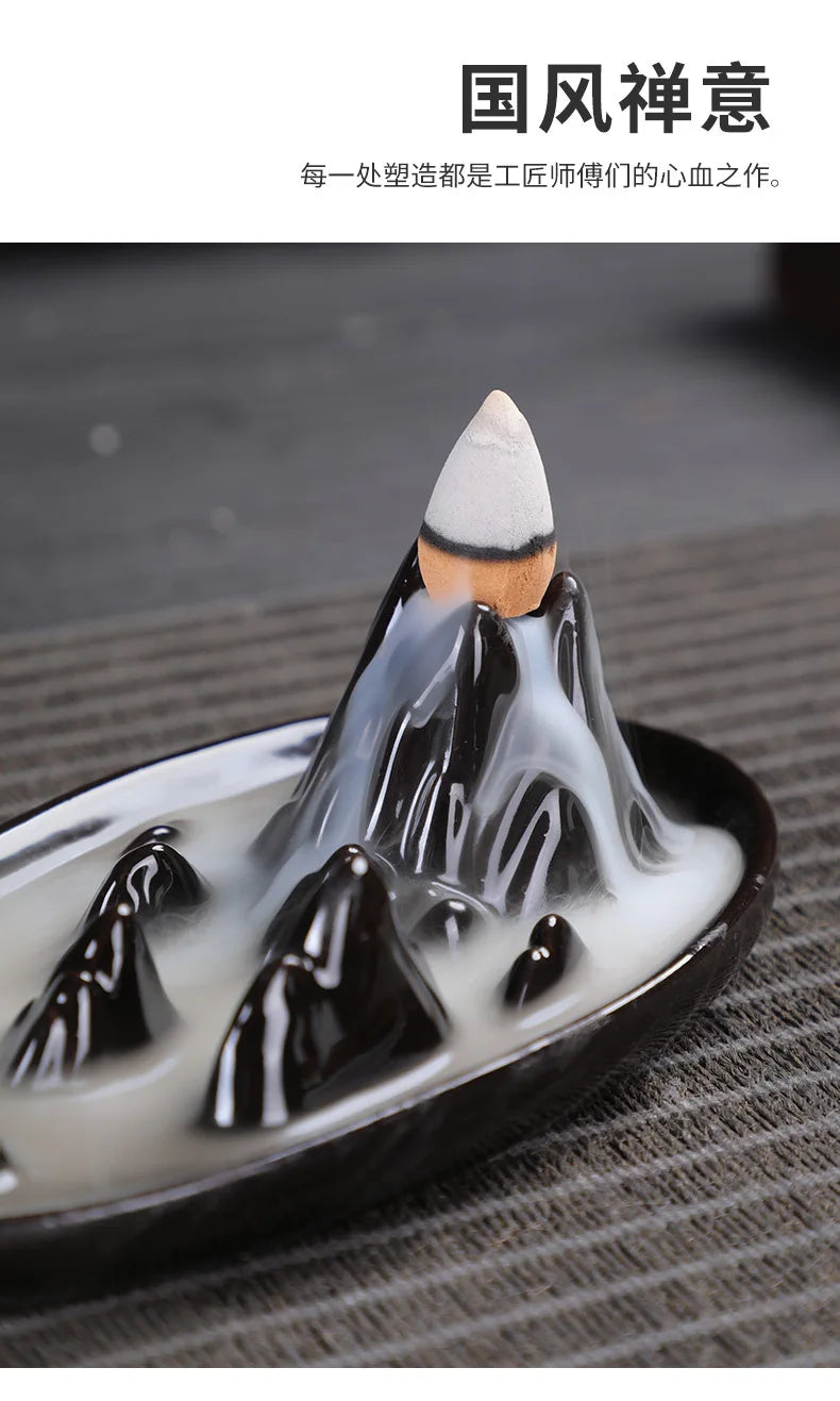 Tower backflow incense burner with white cone and mirrored mountain-like smoke