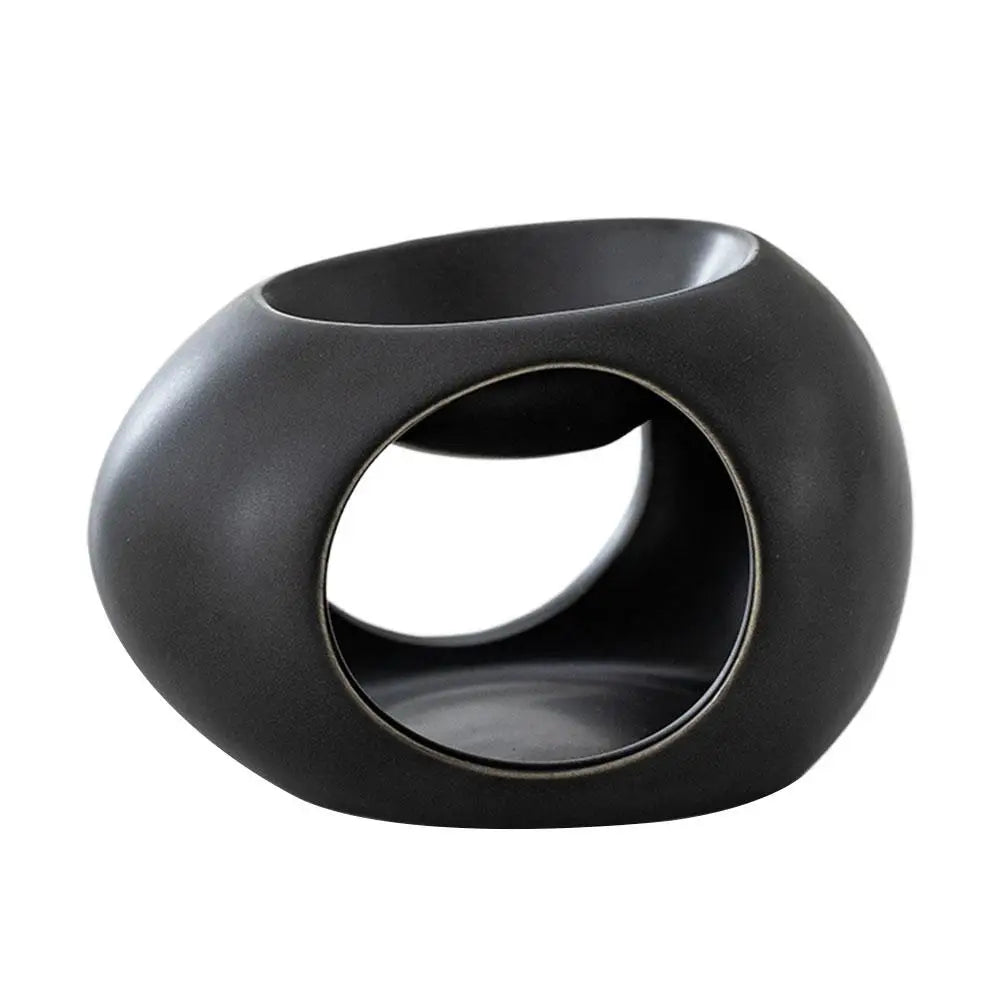 Black ceramic aroma burner with rounded body and oval opening