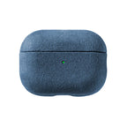 Alcantara AirPods case in blue, closed design with seam across the middle