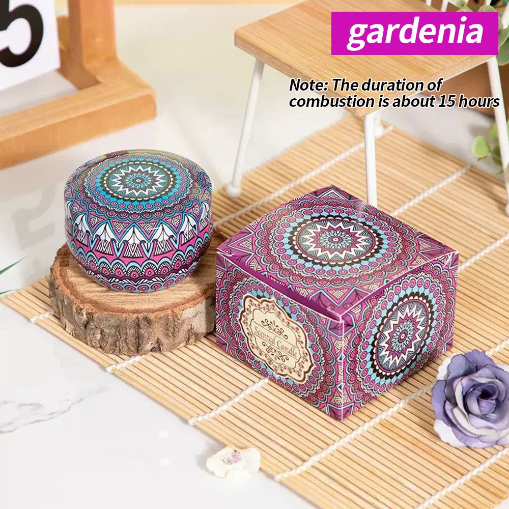 Gardenia floral aromatherapy candle, pink patterned tin on bamboo mat