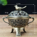 Copper lotus incense burner with bird finial and embossed lotus pattern, side dimensions shown