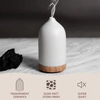 Ivory white ceramic diffuser with transparent matte finish and quiet operation design