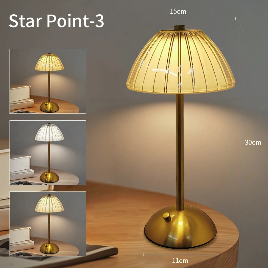 Cordless dimmable night lamp with ribbed golden dome shade and gold base