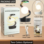 Boxed rotating suspension table lamp with dark gray base and white glowing orb