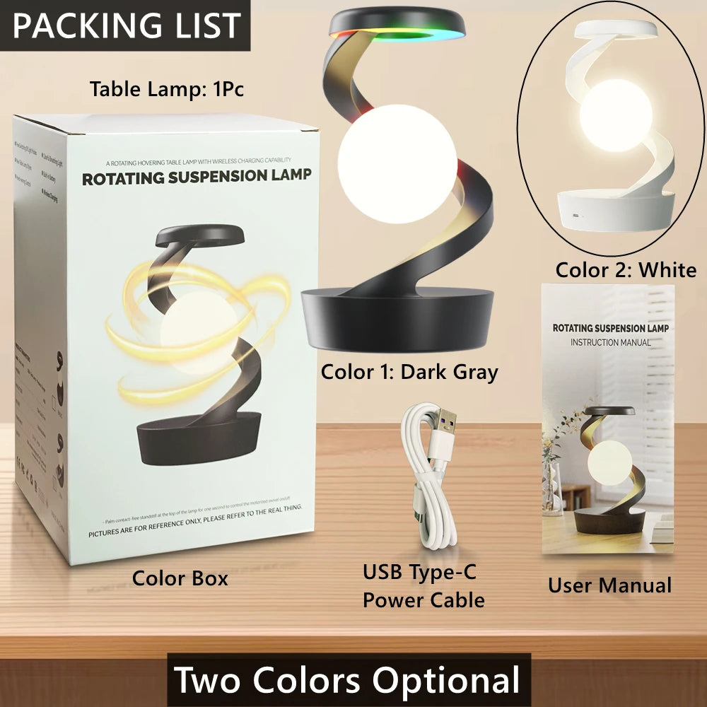 Boxed rotating suspension table lamp with dark gray base and white glowing orb