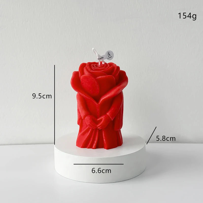 Red rose-shaped candle figure on a round base, size 9.5 cm, 154 g