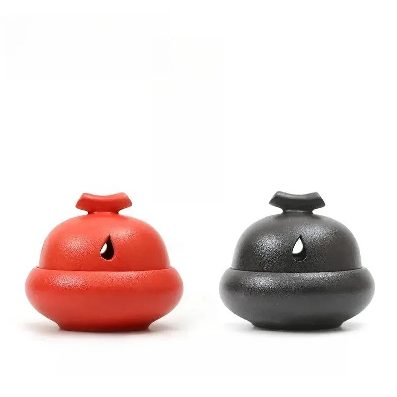 Stone Glaze (red) and Ash Glaze (dark) ceramic incense stoves with central opening