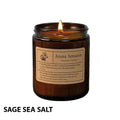 Luxury glass cup scented candle in amber jar, "Sage Sea Salt" label