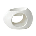 White ceramic aroma burner with oval cutout and recessed open top