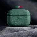 Italian suede AirPods case, emerald sage green finish with central button cutout