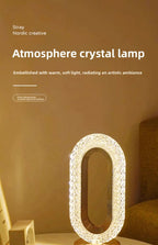 Pearl white crystal oval lamp with gold base, warm night light profile