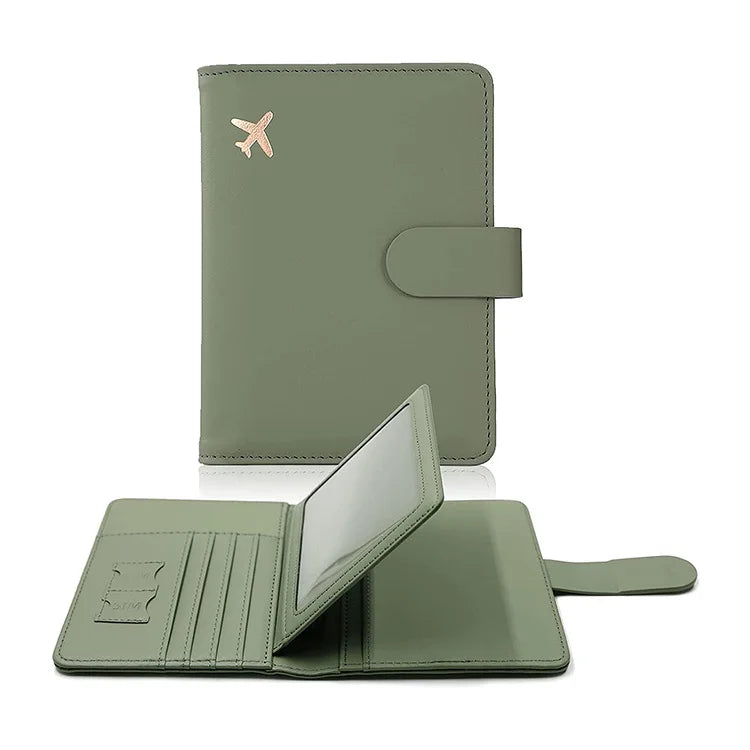Forest green passport cover with hasp clasp; interior shows card slots