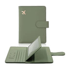 Forest green passport cover with hasp clasp; interior shows card slots