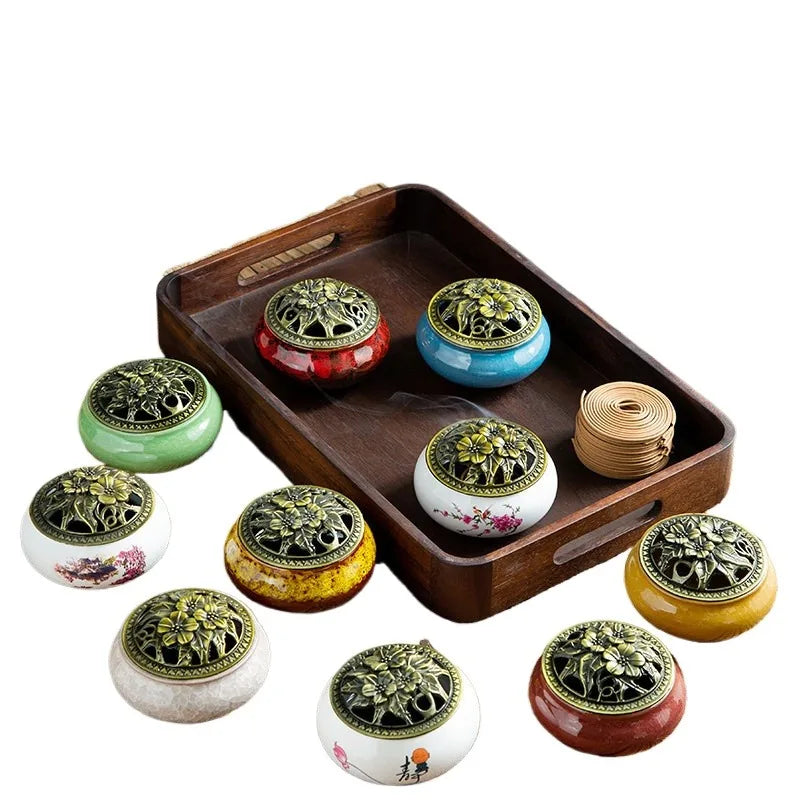 Ceramic incense burner set with multiple mini burners in a wooden tray