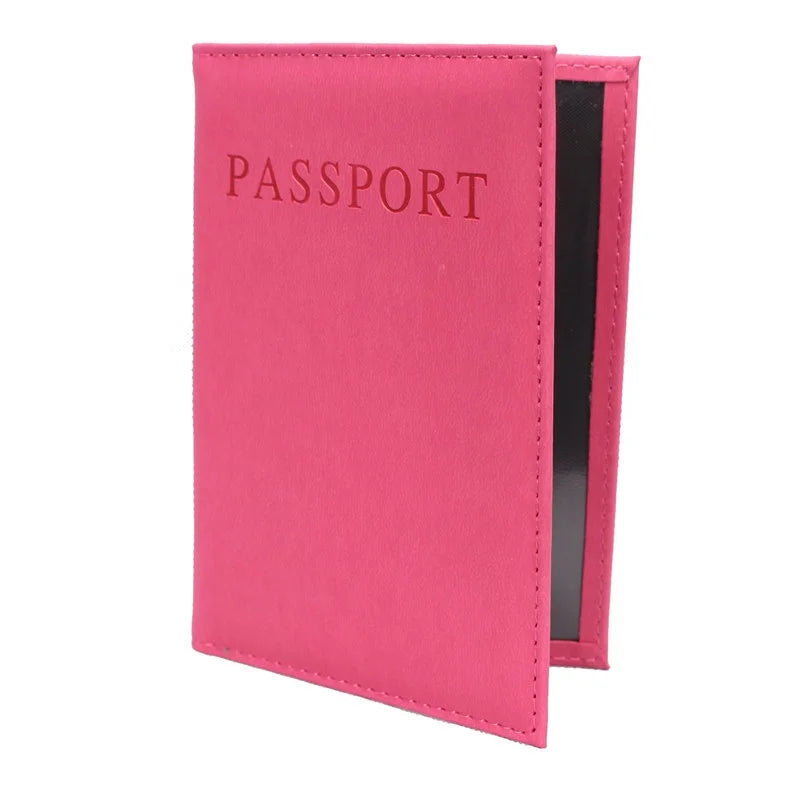 Pink rose passport sleeve with embossed “PASSPORT” and black interior panel