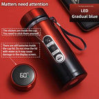 Red LED thermos flask with LED temperature display reading 60°C and wrist strap