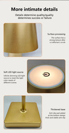 Gold desk lamp details: textured shade, soft LED glow, and thick square base