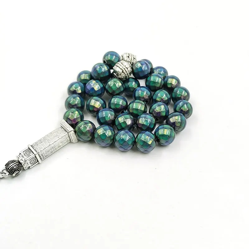 Tasbih misbaha with faceted green-blue beads and silver rectangular connector
