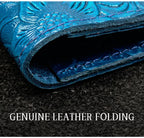 Blue leather folio edge with genuine leather folding and embossed floral detail.