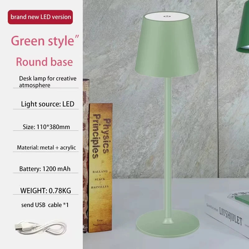 Wireless touch table lamp in mint green with rounded base and included USB cable