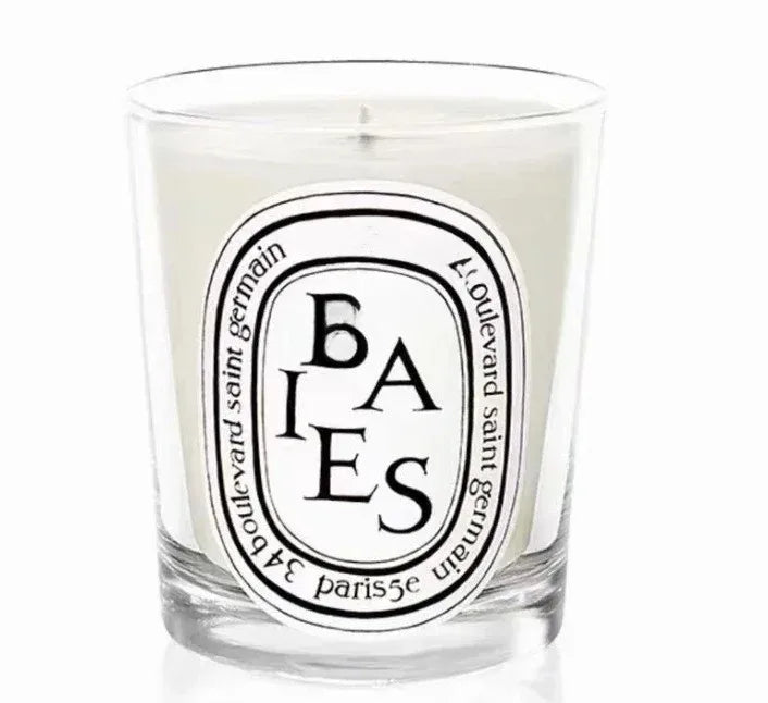 190g scented botanical candle in glass jar with BAIES label and pale wax
