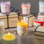 Aromatherapy candle gift box: glowing yellow scented candle in glass jar, 55g label