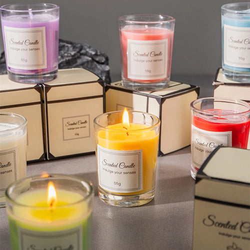 Aromatherapy candle gift box: glowing yellow scented candle in glass jar, 55g label