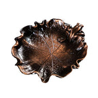 Leaf-shaped metal incense holder tray with embossed vein pattern