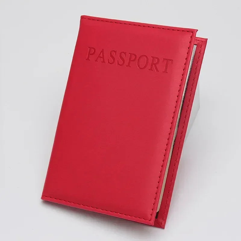 Crimson rouge classic travel passport sleeve with “PASSPORT” lettering