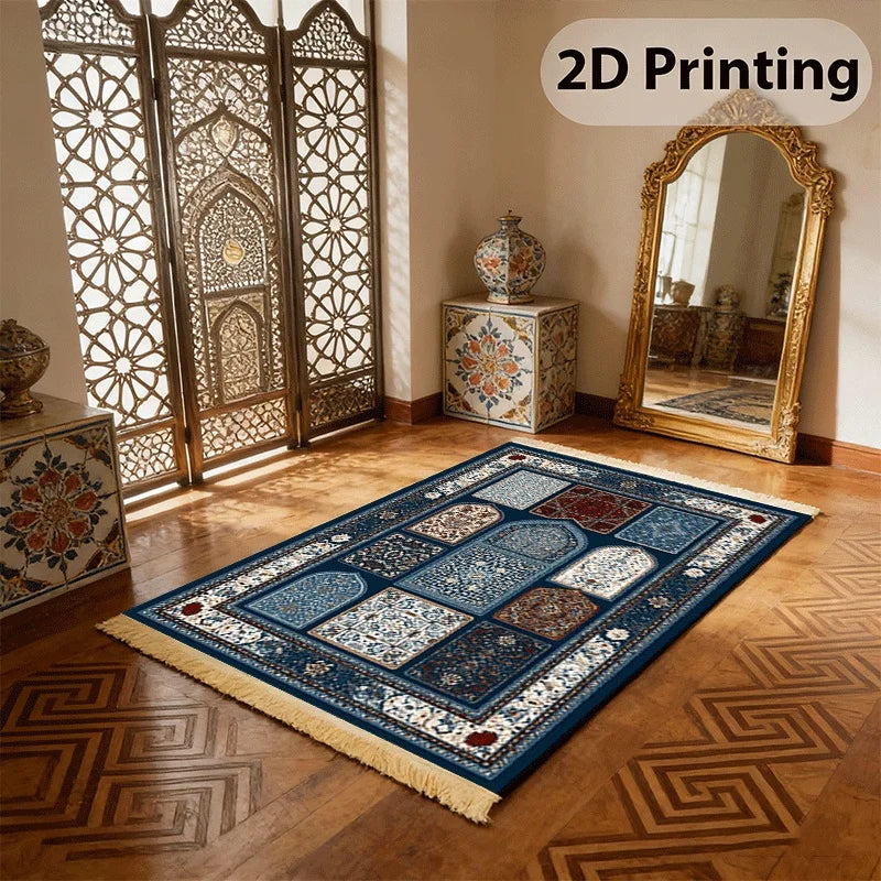 Islamic-style prayer mat laid flat, blue geometric mihrab design with beige fringe
