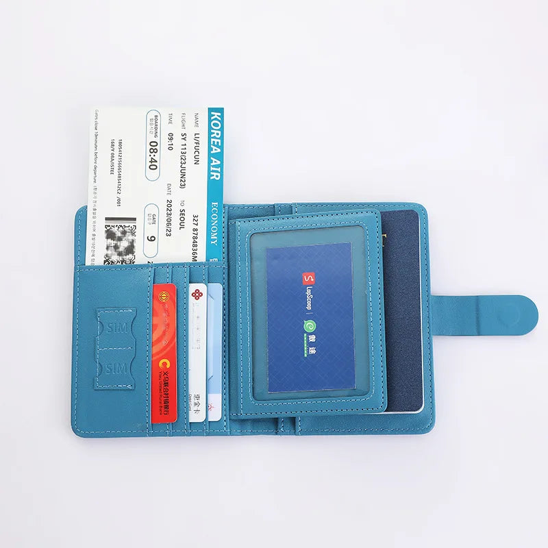 Blue passport folio opened with interior card slots and document pockets