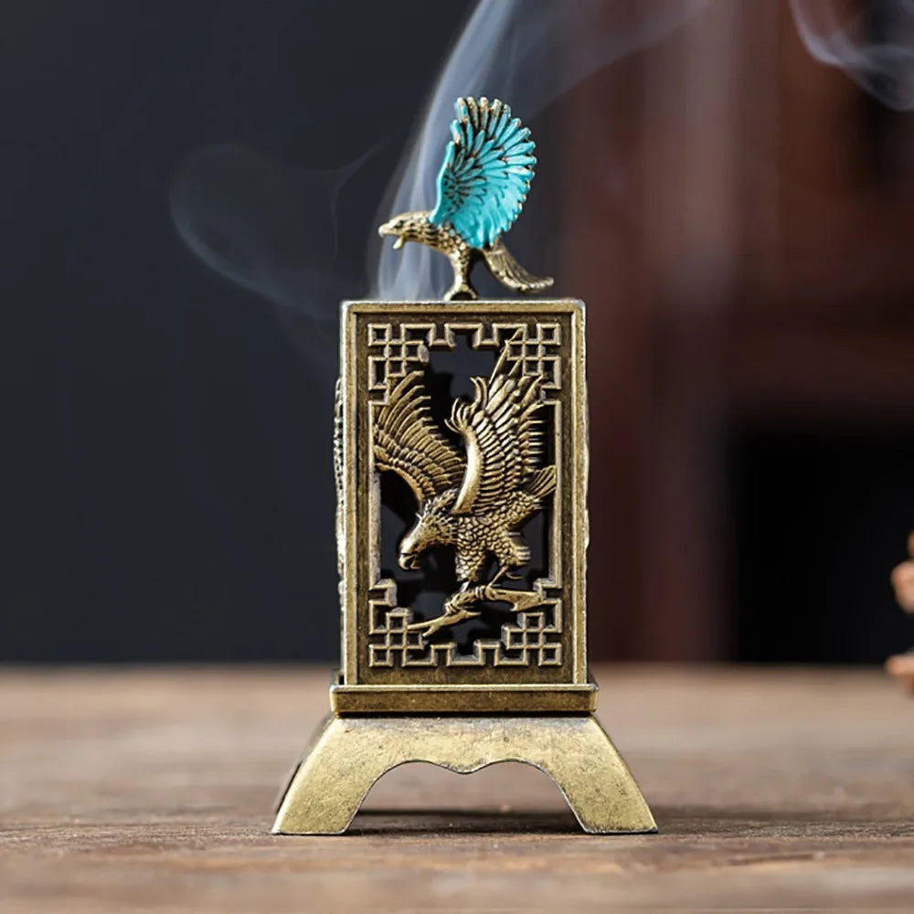 Gold incense holder with peacock relief on front panel and tall incense top