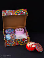 4-piece Arabian pattern scented candle gift set with four round candles in patterned box