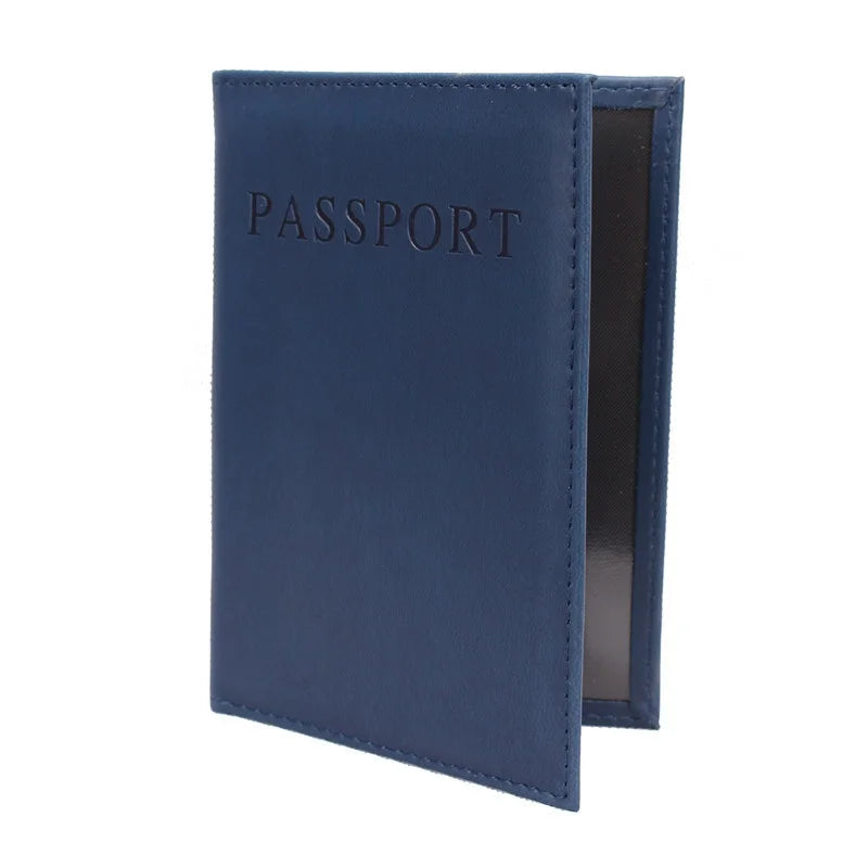 Navy passport sleeve with embossed “PASSPORT” and stitched side opening
