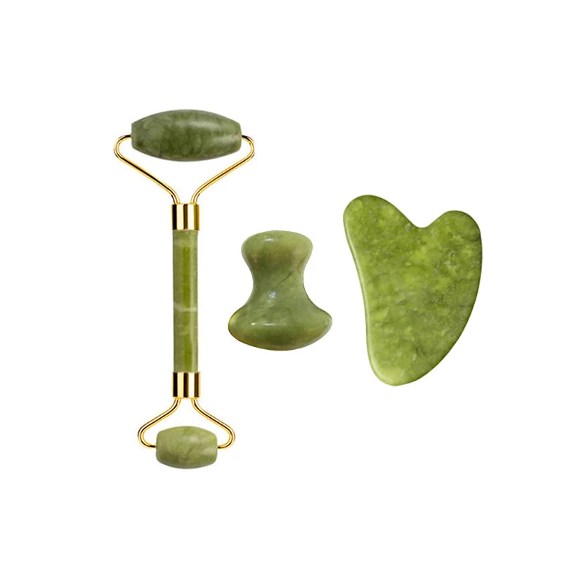 Jade facial tools set: ribbed roller, small bottle-shaped stone, and curved gua sha