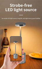 Classic stepless dimming table lamp shown in packaging box with visible lamp silhouette