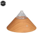 Compact wood grain aroma diffuser with clear glass top and circular power button