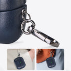 Metal keychain AirPods case in dark blue leather with keyring clip detail
