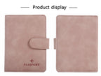 Blush passport folio front and back view with side strap and stitched edges