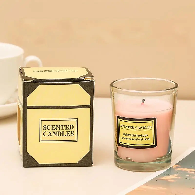 Romantic aromatherapy candle in glass, light pink wax; box labeled Scented Candles