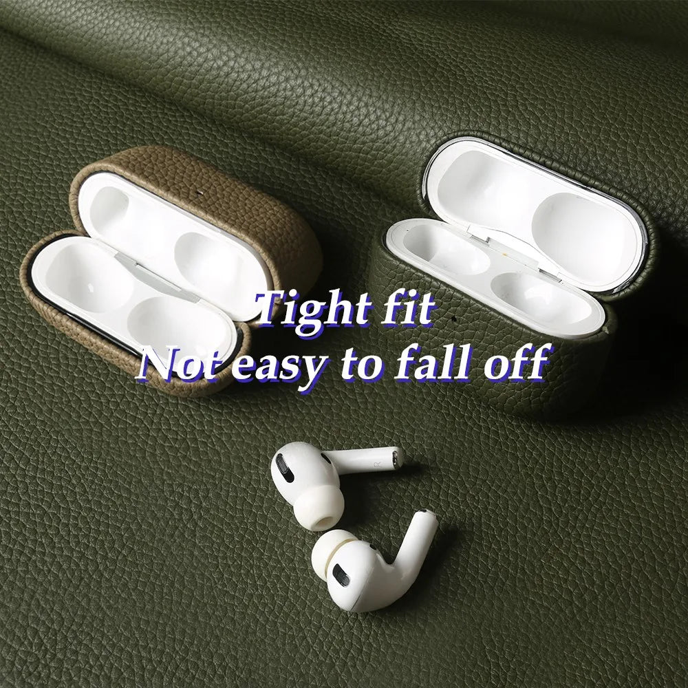 Dark green cowhide AirPods case open with white earbuds fitted inside