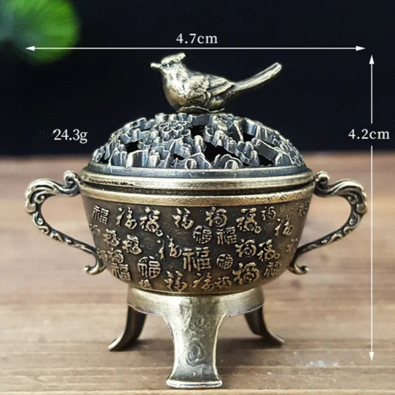 Copper lotus incense burner with bird finial, lidded pot and ornate side handles
