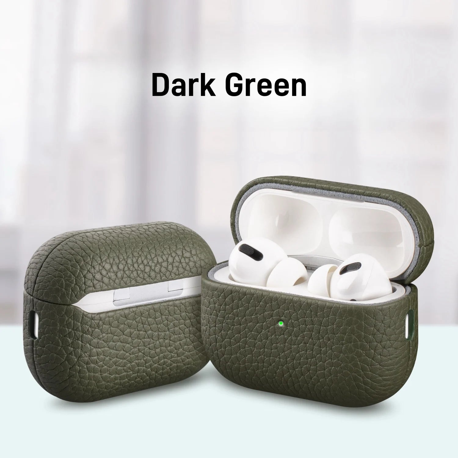 Dark green leather AirPods Pro case with lid open, earbuds visible inside