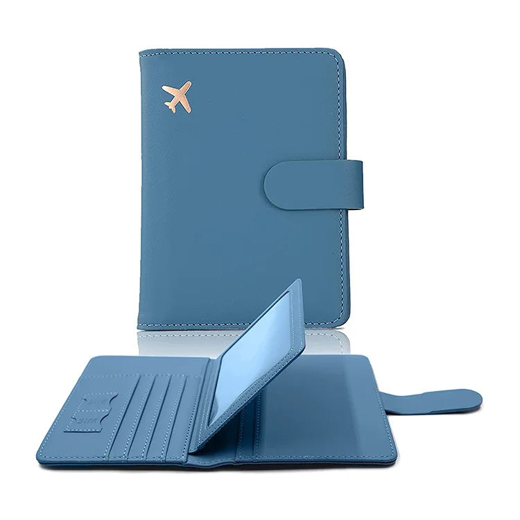 Blue vegan leather passport cover with hasp clasp; opens to card slots