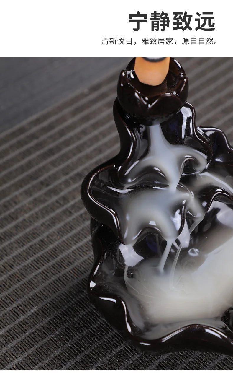 Tower backflow incense burner with black glossy base and central cone