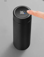 Black smart thermos with digital temperature display on the lid