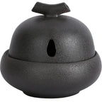 Ash glaze dark grey ceramic incense stove with central oval opening and flared top